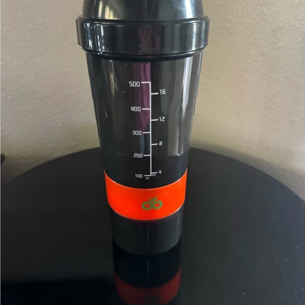 LiveGood Black Shaker Bottle with two compartments for supplements.